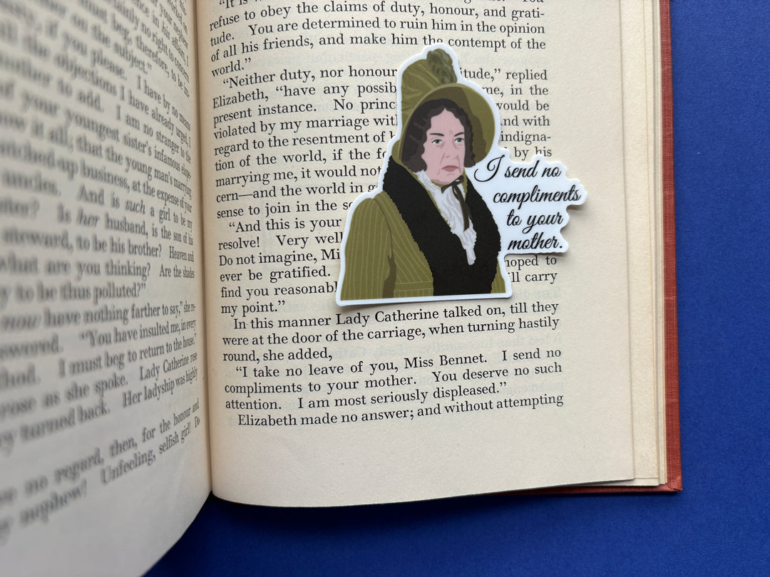 A cartoon of Lady Catherine from Pride and Prejudice 1995 with the text 'I send no compliments to your mother'. Resting on an open book over a blue background.