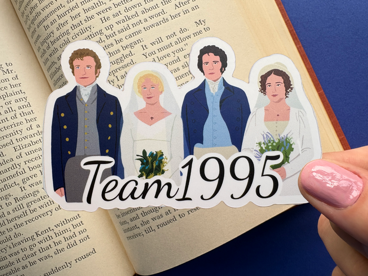 A cartoon of the final wedding scene from Pride and Prejudice 1995 with the text 'Team 1995'. Shown above an open book resting on a blue background.