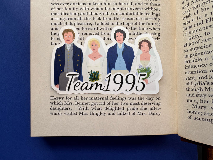 A cartoon of the final wedding scene from Pride and Prejudice 1995 with the text 'Team 1995'. Shown on an open book resting on a blue background.