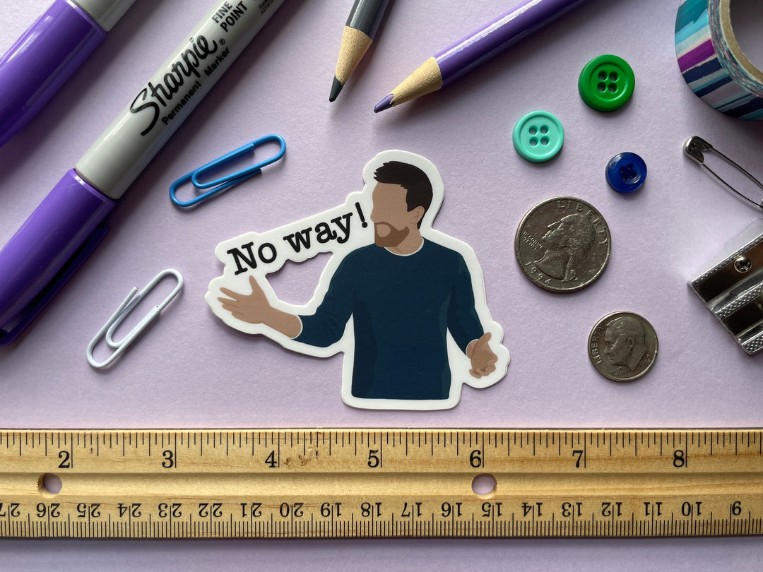 A sticker of comedian Chris Ramsey with his arms spread yelling "No way!" from the TV show Taskmaster is shown on a purple background surrounded by small objects.